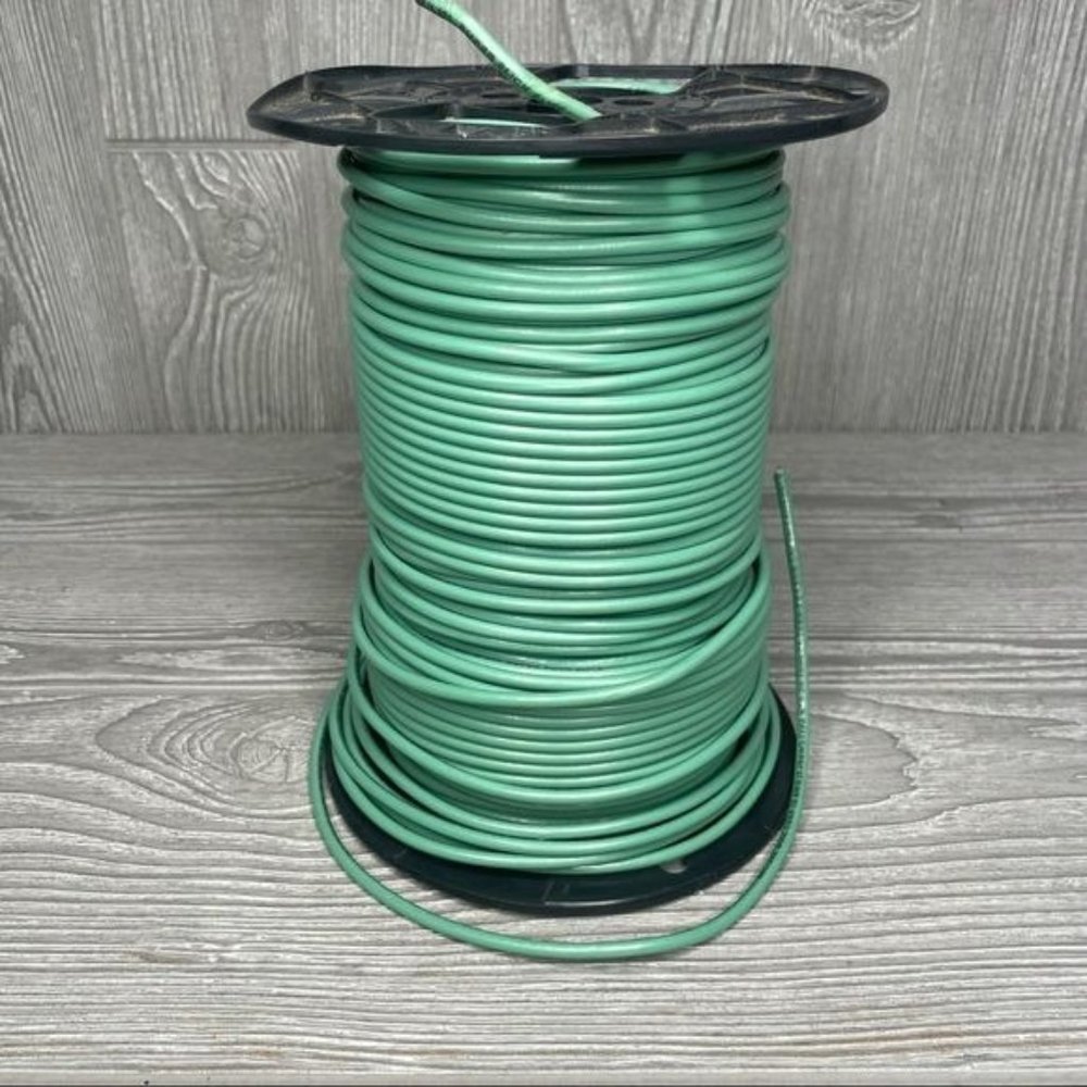 Large spool of encore wire Corp 10awg green copper wire unknown length